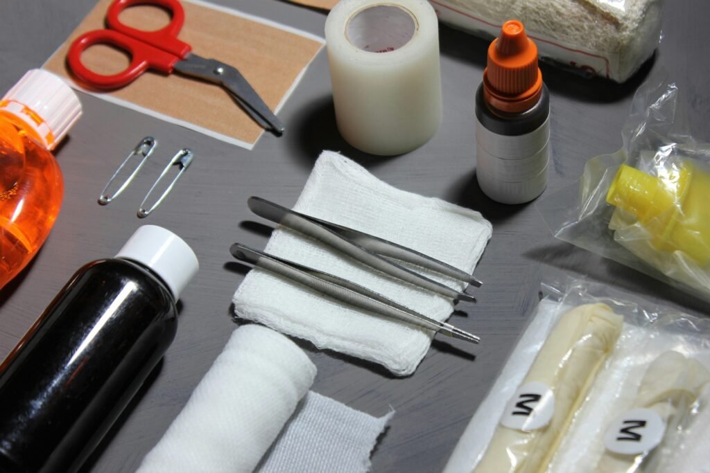 Various survival first aid items for a kit.