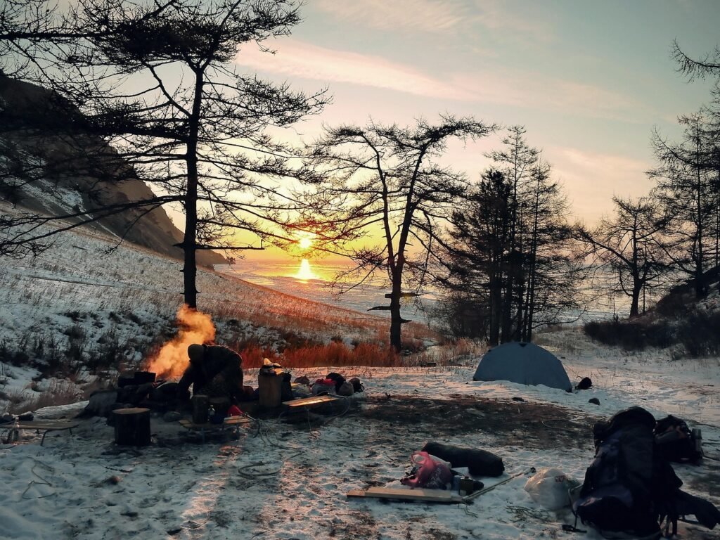 How to camp in cold weather featuring a winter landscape, camping, adventure, outdoor, camp campfire, fireplace, wilderness, bushcraft.