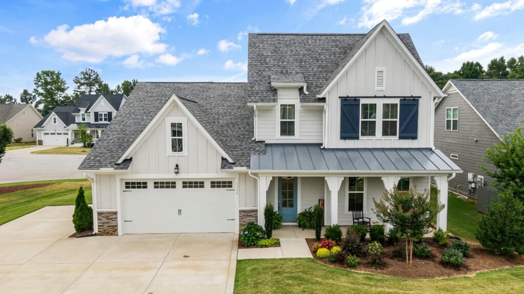 Elegant suburban home with a modern facade and lush yard in Fuquay-Varina, NC. Perfect for real estate listings. Best home defense items in 2026 for beginners. Household preparedness.